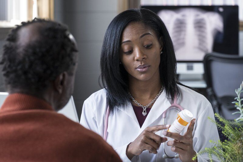 pain management doctors speaking to patient about over the counter medications