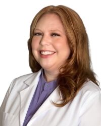 Lindsey VanFossen, team member at MidSouth Pain Treatment Center, professional headshot in a white lab coat.